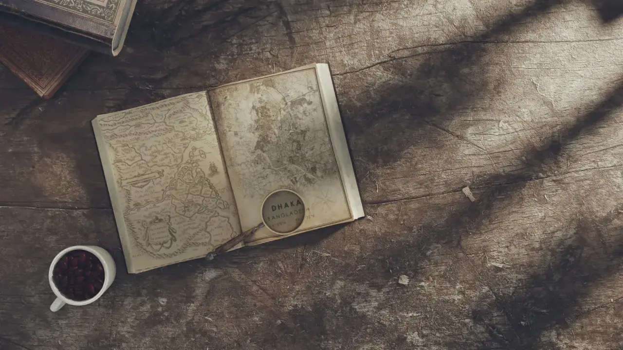 Un livre ouvert avec une carte ancienne, une loupe sur Dhaka, Bangladesh. L'inspiration pour écrire un livre dont vous êtes le héros.